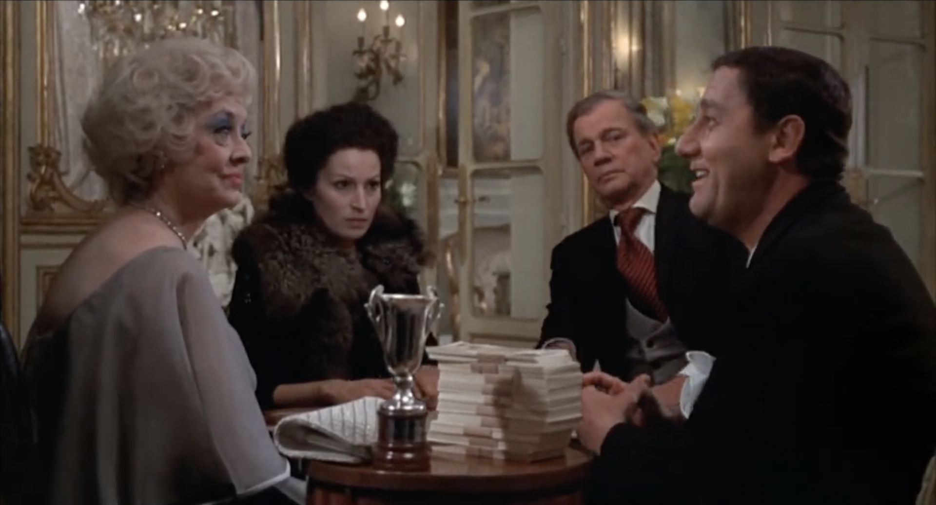 Imagem de referência relacionada a Lo Scopone scientifico, item descrito como filme de 1972 dirigido por Luigi Comencini